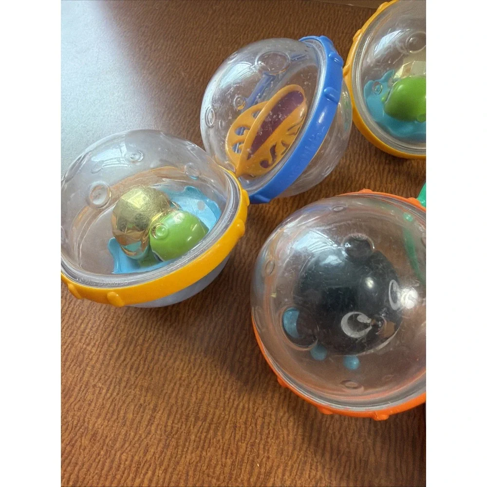 Munchkin Balls Rattles Turtle Penguin Spinner Toys Lot of 9 Baby Bath & Sensory